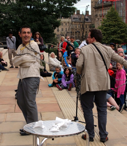 Steve Faulkner gets wrapped up in his work at the 2013 Sheffield Street Magic Festival.